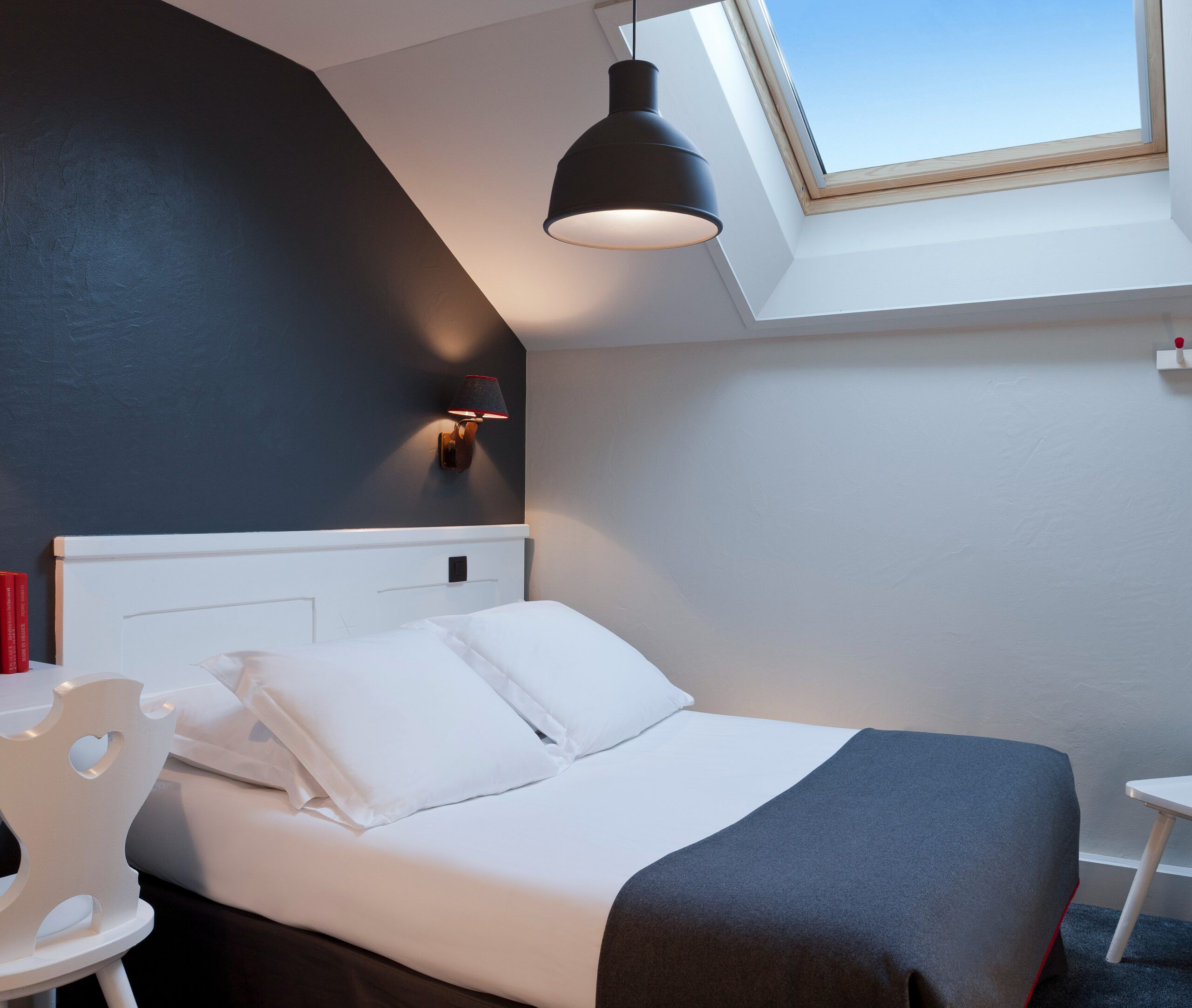 double bed in classic bedrooms under skylight